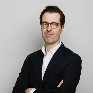 Dr. Tim Schlösser
